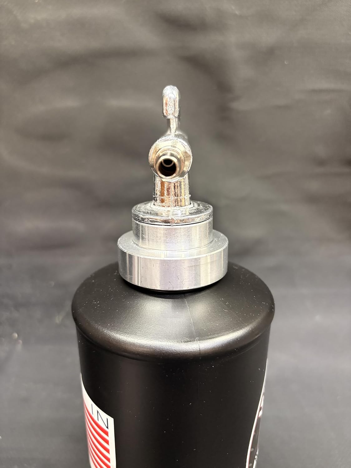 Gal. Fluid Film Amber, Semi Pro Undercoating Gun, 1 Wand, 2 W Qt. Bottles, and 50 Rust Plugs