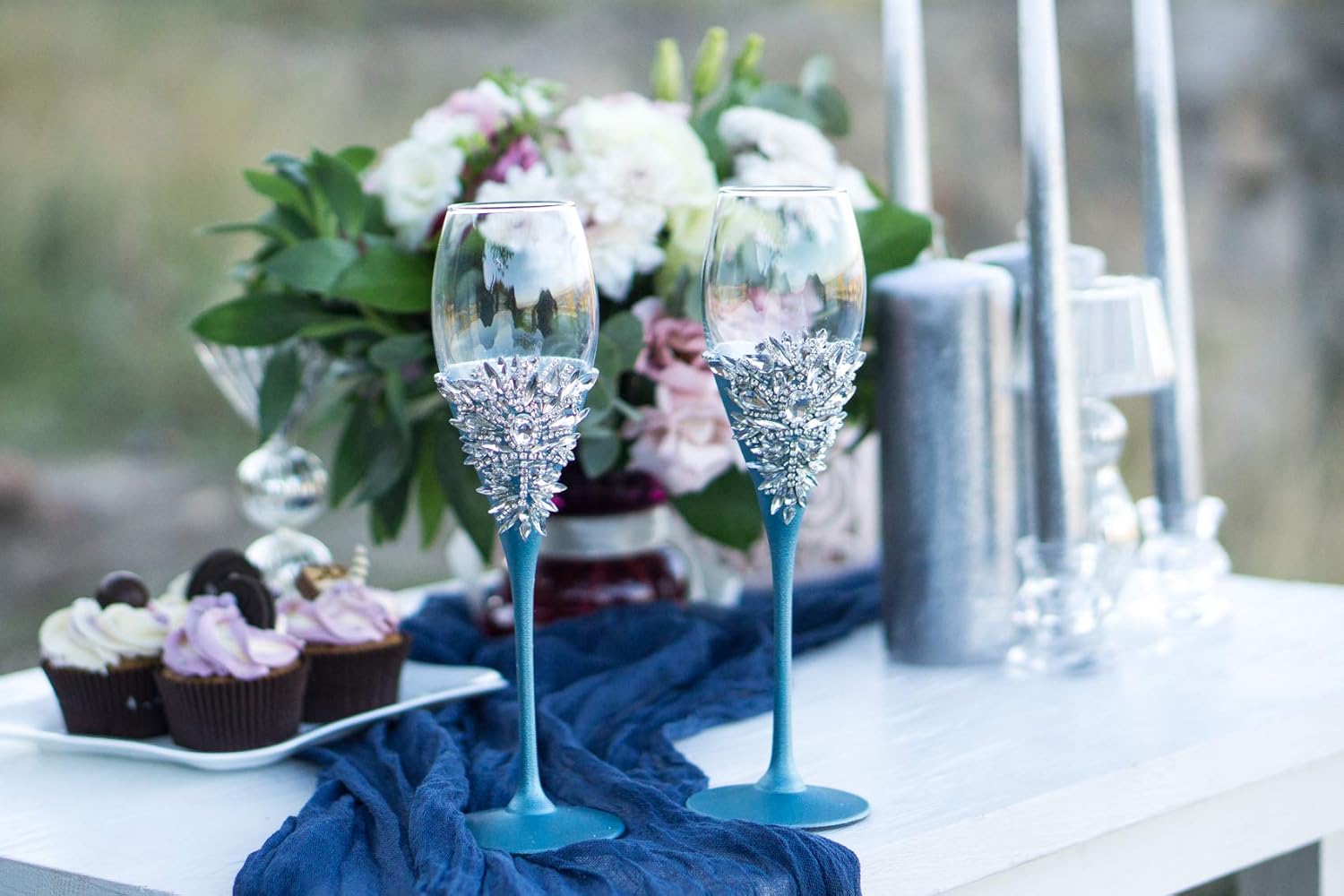 Personalized dusty blue wedding flutes decorated with silver crystals