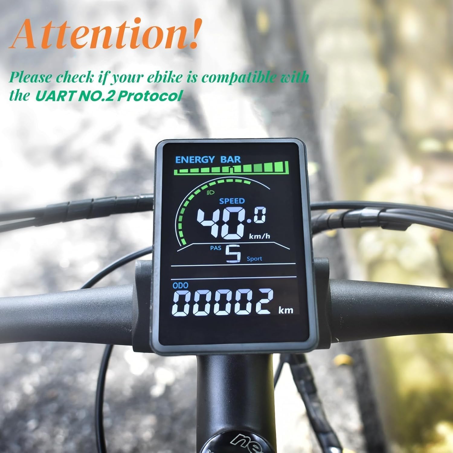 Ebike display with an attention message about UART No. 2 Protocol compatibility