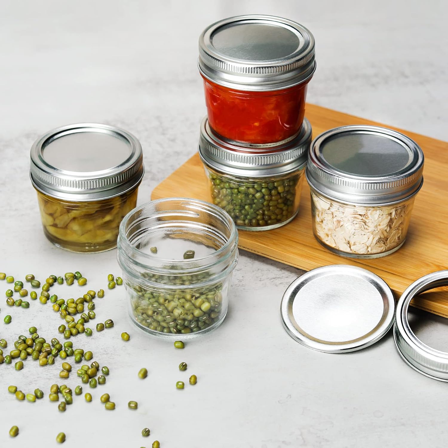 Small Mason Jars 4 oz - 12 Pack Glass Canning Jars with Regular Airtight Lids and Bands, Mini Clear Mason Jars for Preserving, Honey, Jam, Baby Food, Kitchen Spices, Tea, DIY Projects, Dishwasher Safe : Home & Kitchen