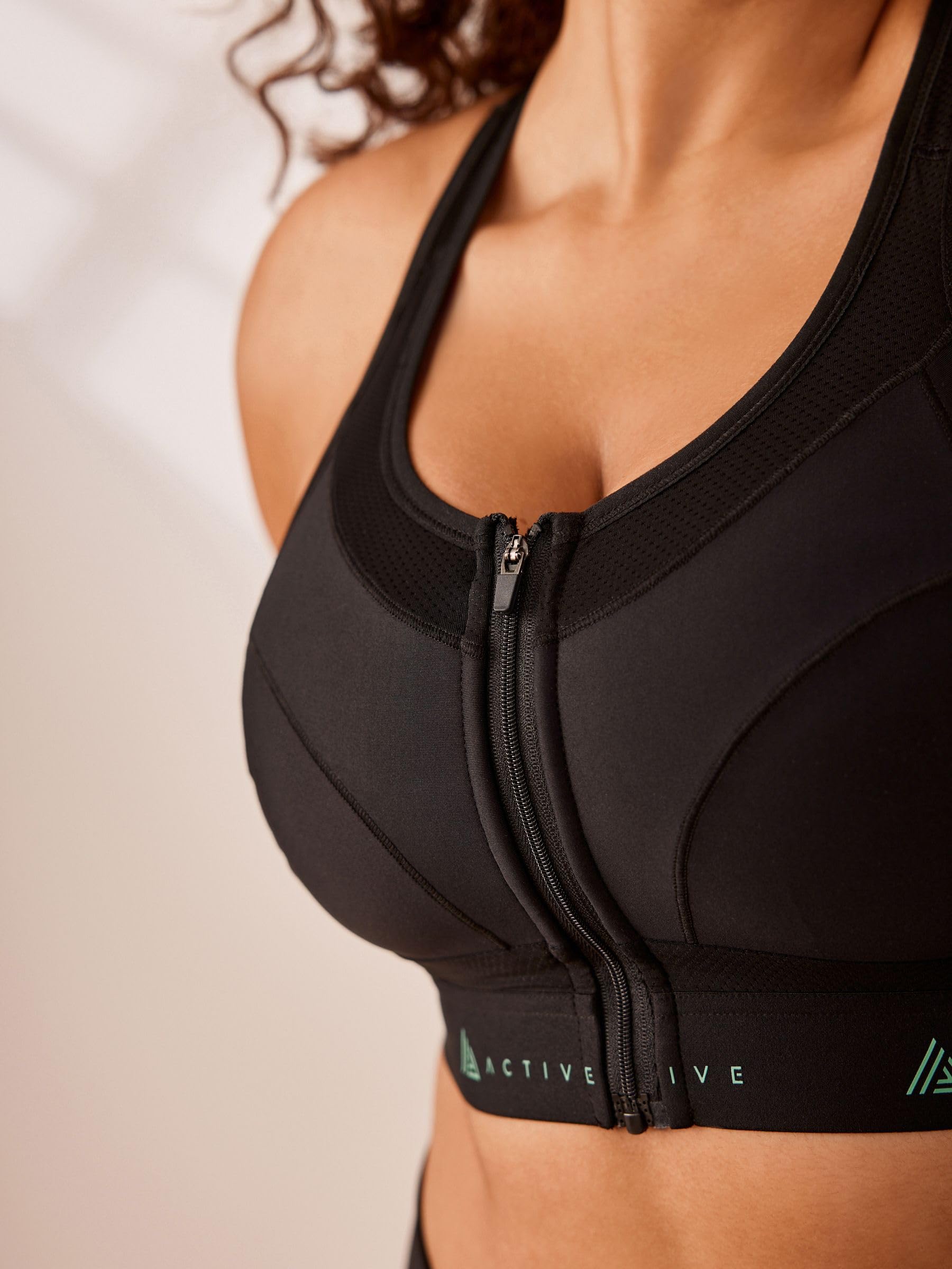 NEXT Mujeres Sujetador Deportivo de Muy Alto Impacto con Cremallera Frontal y diseño de Secado rápido DD+