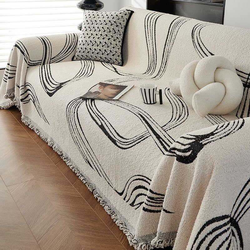 Housse de canapé lavable pour protéger le mobilier familial au quotidien dans un salon gris