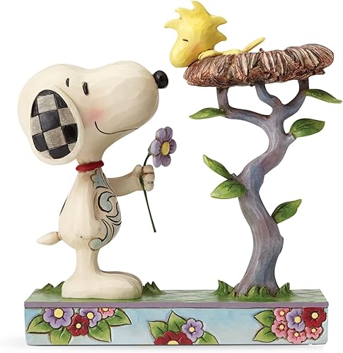 Enesco Peanuts by Jim Shore Snoopy con Woodstock en figura de nido, 6.75 pulgadas
