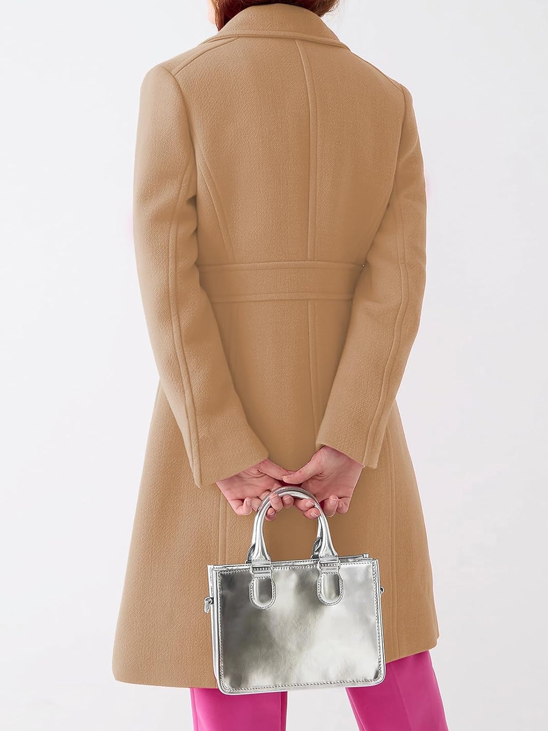 Back View of Women's Camel Overcoat and Silver Tote Bag