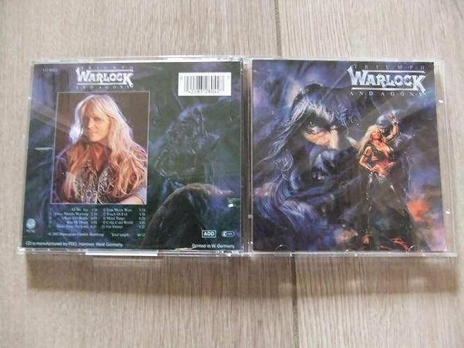 Triumph and Agony : Warlock: Amazon.es: CD y vinilos}