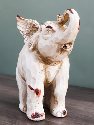 Vista 5 de Ebros Gift Fantástico elefante alado de ángel con tronco hacia arriba, escultura de madera sintética, figura de resina tallada en madera sintética