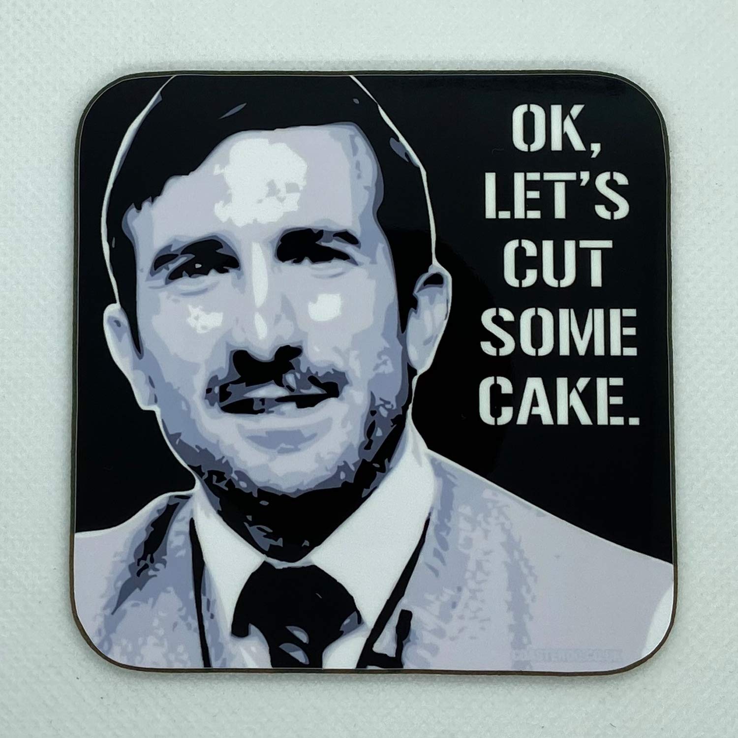 Ok, Let's Cut Some Cake - Wikus Van De Merwe from District 9 - Drinks Coaster - Hardboard - 9cm x 9cm - Gloss Finish
