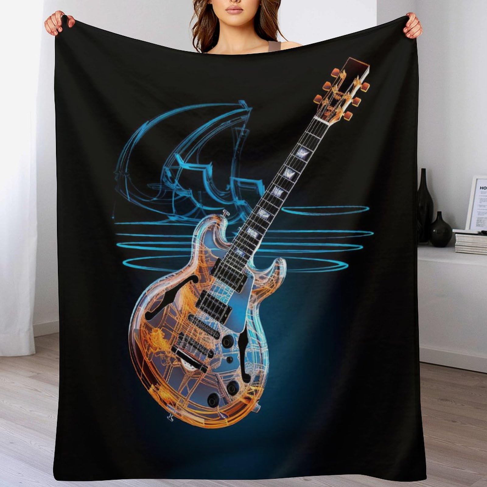 Couverture guitares flanelle idéale pour vos soirées cocooning au balcon