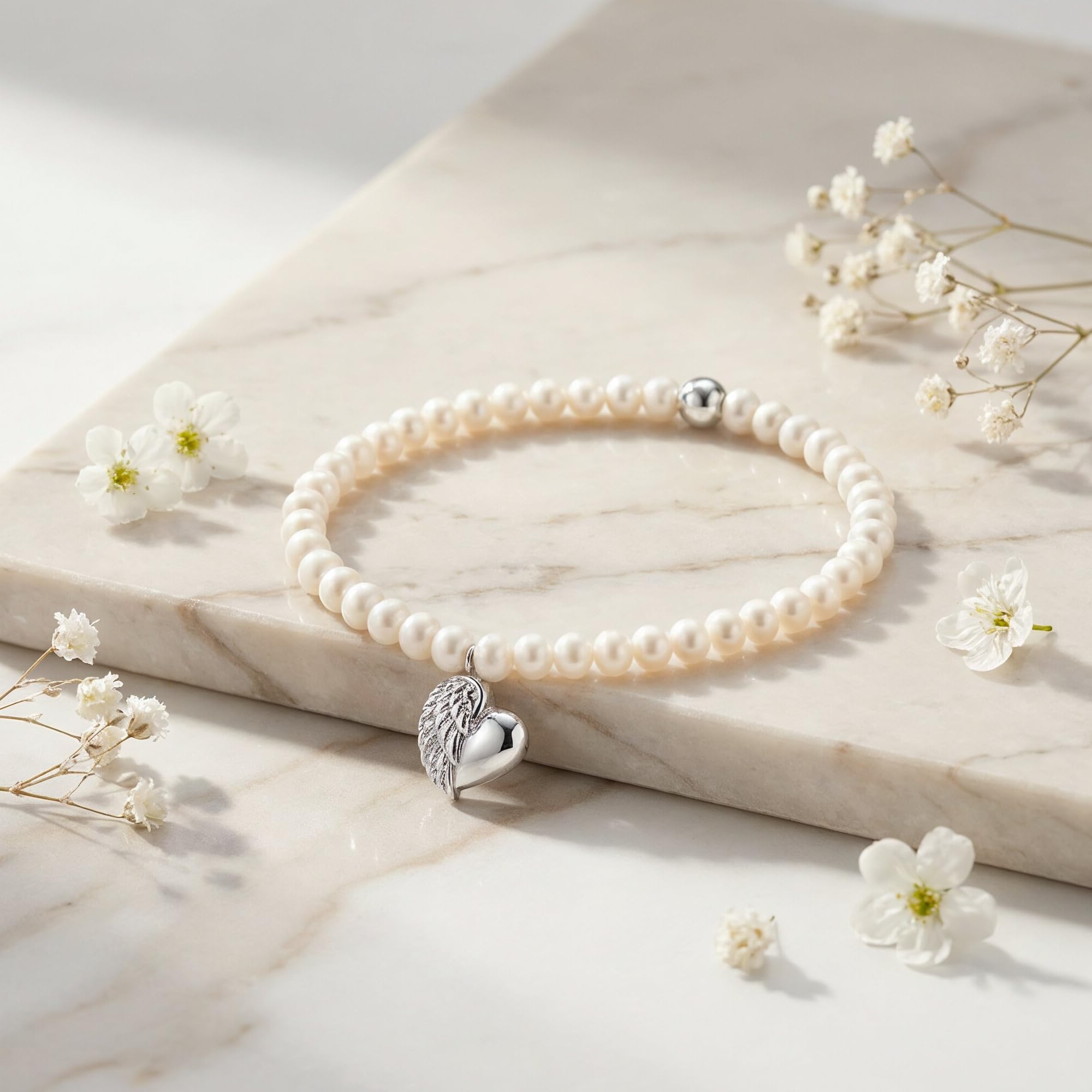Engelsrufer Damen Stretch-Armband aus Sterling Silber mit Süßwasser-Perlen und Herzflügel-Anhänger, nickelfrei, 17 cm
