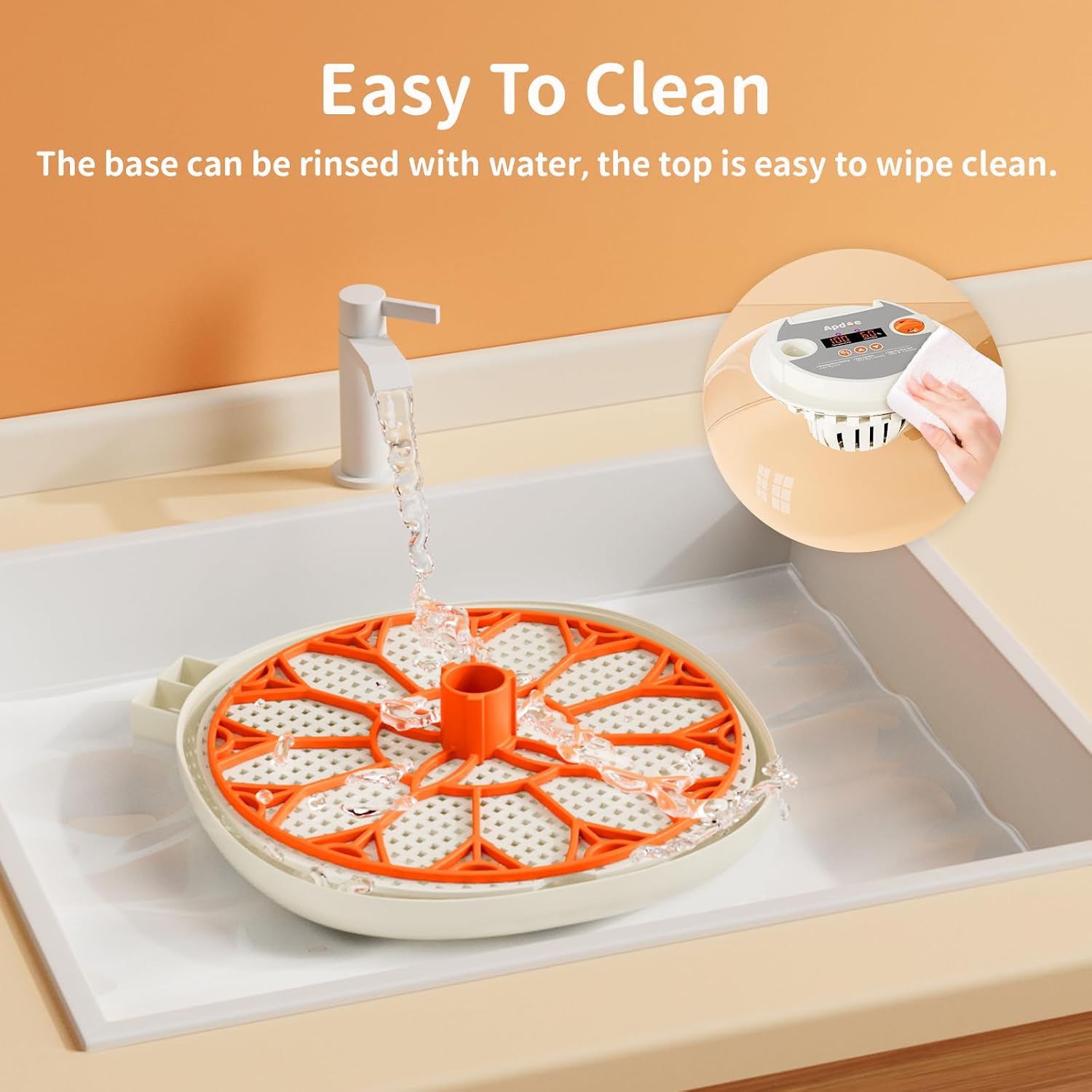 Apdoe incubator base being rinsed under a faucet