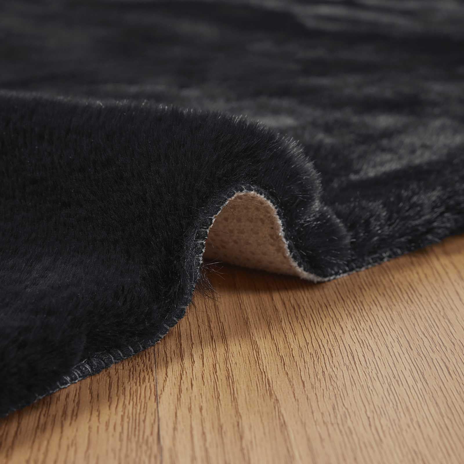 Kunstfell Teppich Rund 120x120 cm Schwarz, Weicher Fellteppich aus Polyester, Rutschfester Kuschelteppich für Wohnzimmer Schlafzimmer und Flur, Moderne Wohndeko