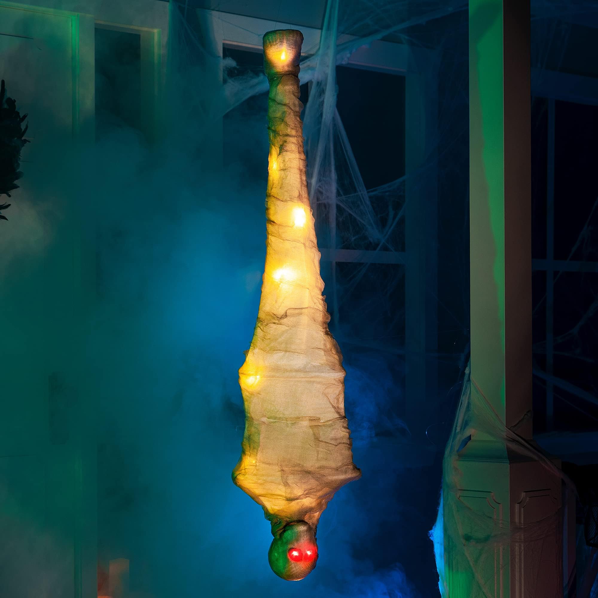 Cadavre de cocon suspendu Halloween lumineux JOYIN décoration horreur 119 cm