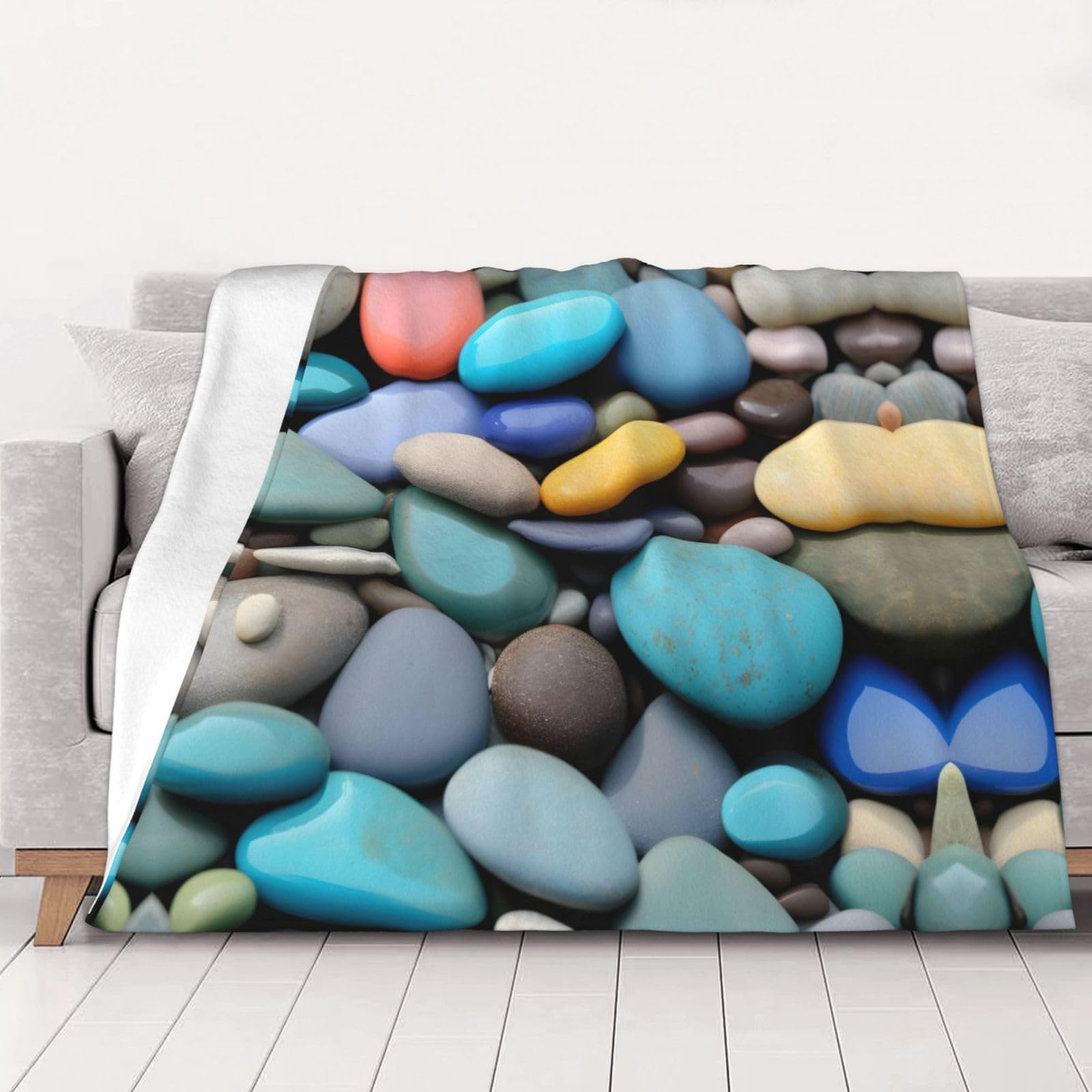 Couverture super douce galets colorés pour vos soirées cocooning au salon