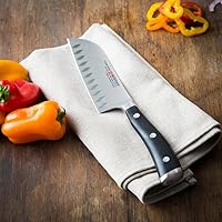 Vista 2 de Wusthof Classic Ikon cuchillo santoku con filo hueco, Negro