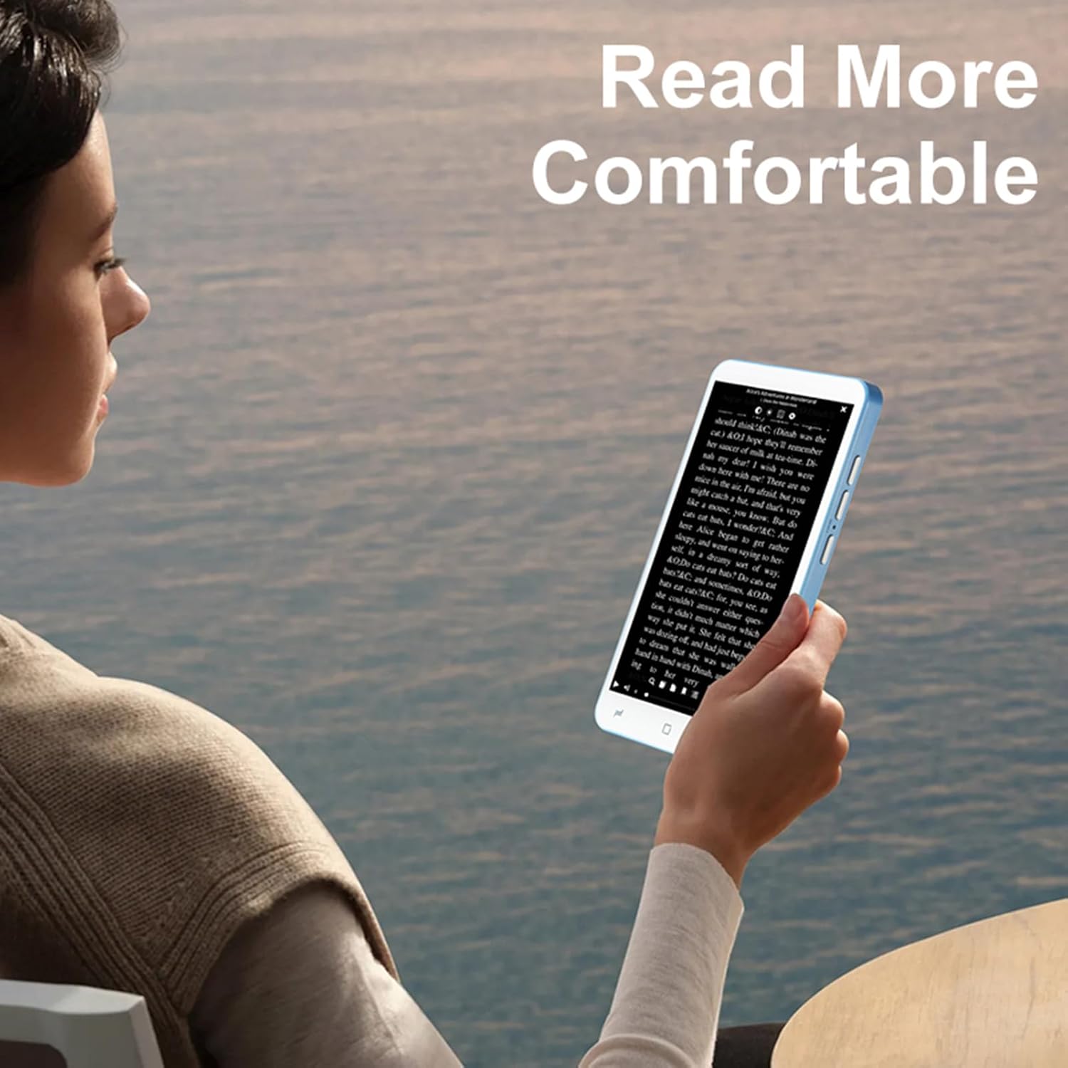 Person comfortably holding and reading on the ASHATA E-Reader.