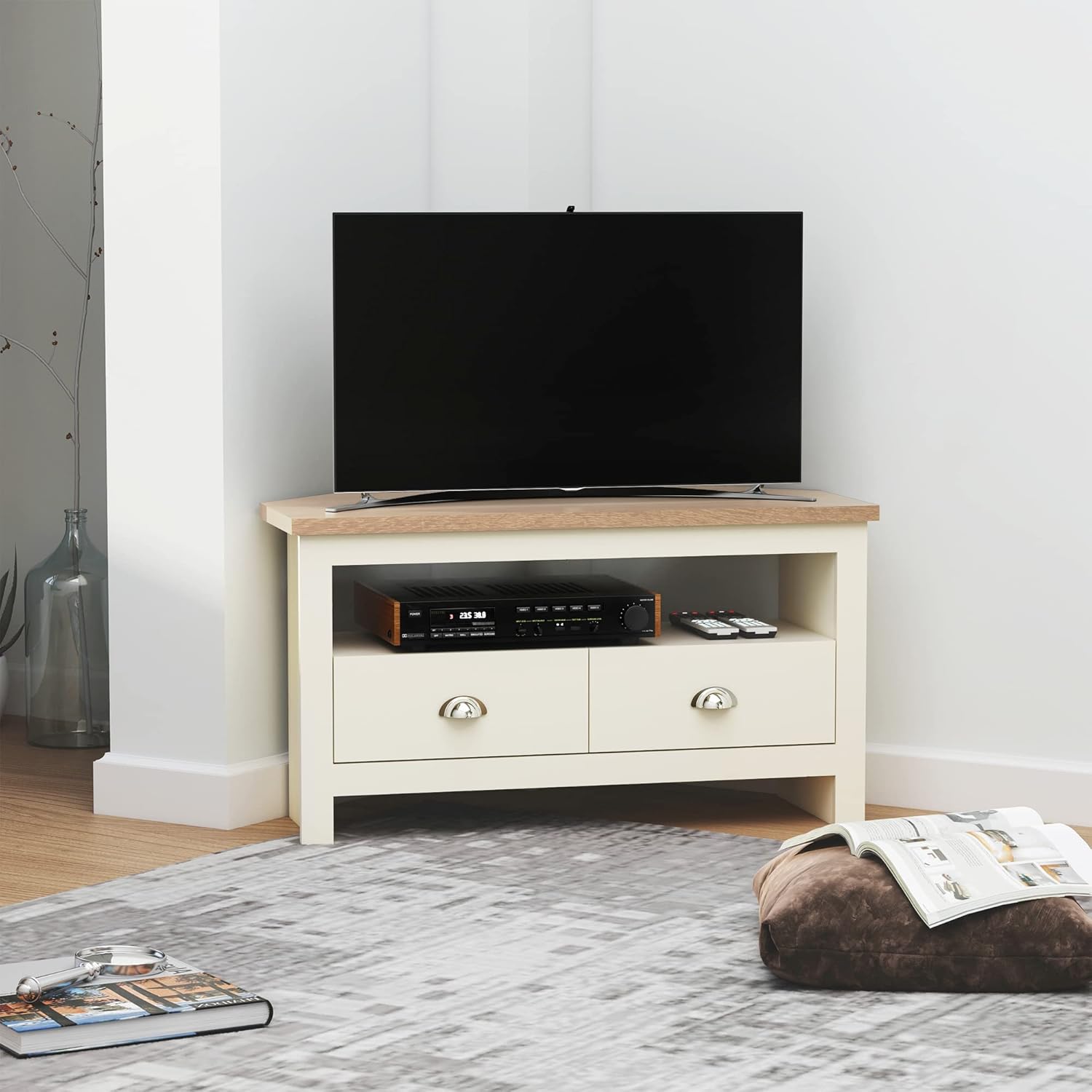 HOMCOM Corner TV Stand placed in a living room corner with a television and media devices