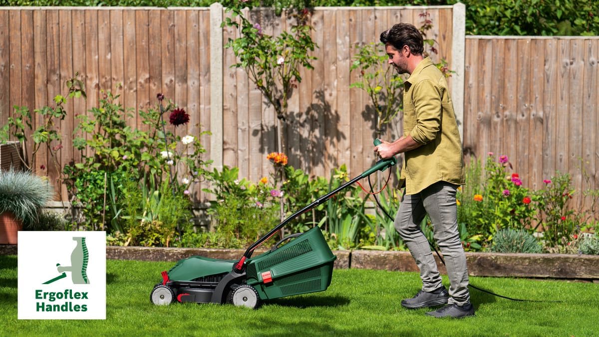 User operating the Bosch lawnmower with Ergoflex handles