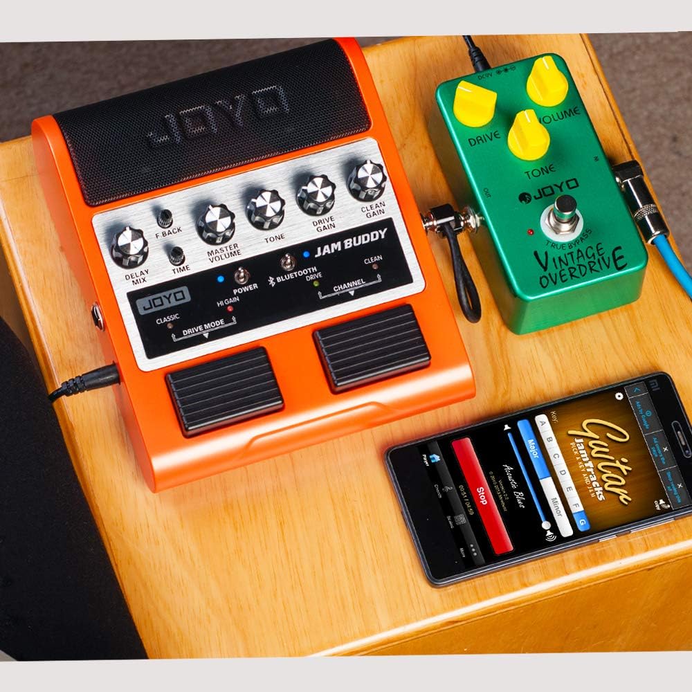 JOYO JAM Buddy connected to an external overdrive pedal and smartphone