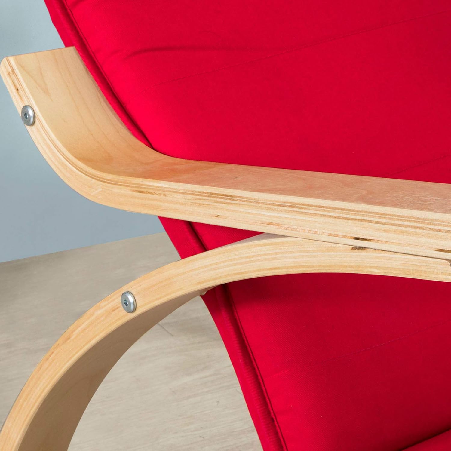 Close-up of the curved birch wood armrest of the SoBuy FST16-R rocking chair, highlighting the smooth finish and natural grain.