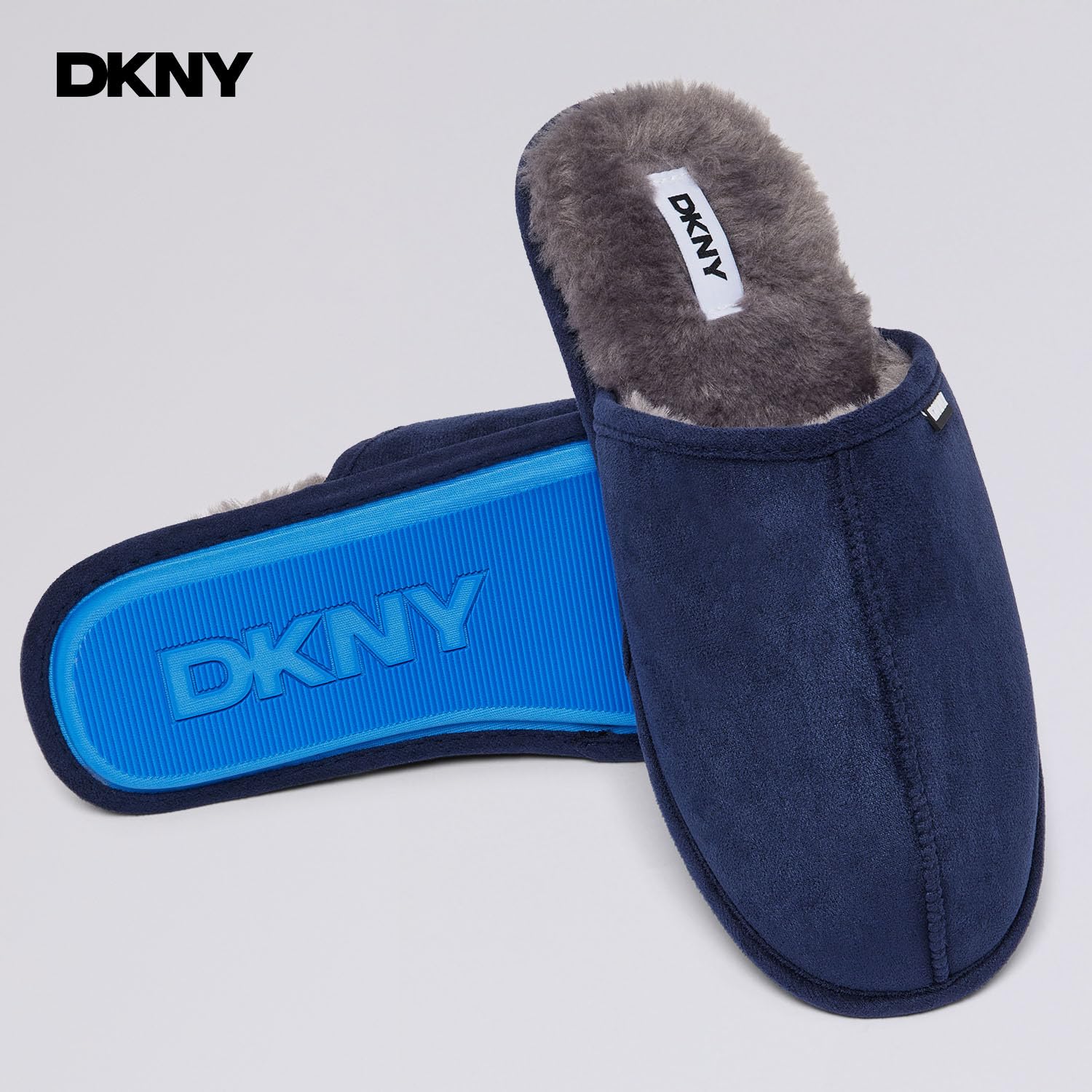 DKNY Kapcie męskie, wygodne, zamszowe kapcie dla mężczyzn z ciepłą podszewką ze sztucznego futra, pantofle, miękkie i oddychające, dostępne w kolorze czarnym, szarym, jasnobrązowym i granatowym
