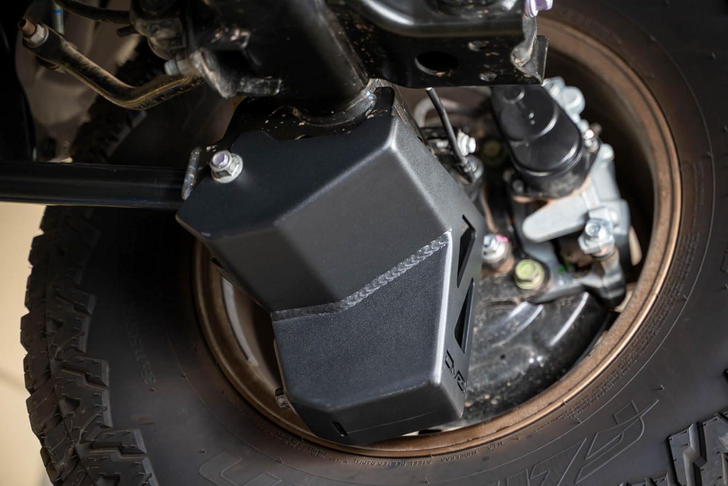 DV8 Rear Shock & Link Skid Plates for 2024 Toyota Tacoma | Protects Lower Shock Mount & Link | Built-in Drain Holes | Single Piece Design | Fully Bolt-On Installation | Black Powder Coat | 4mm Steel