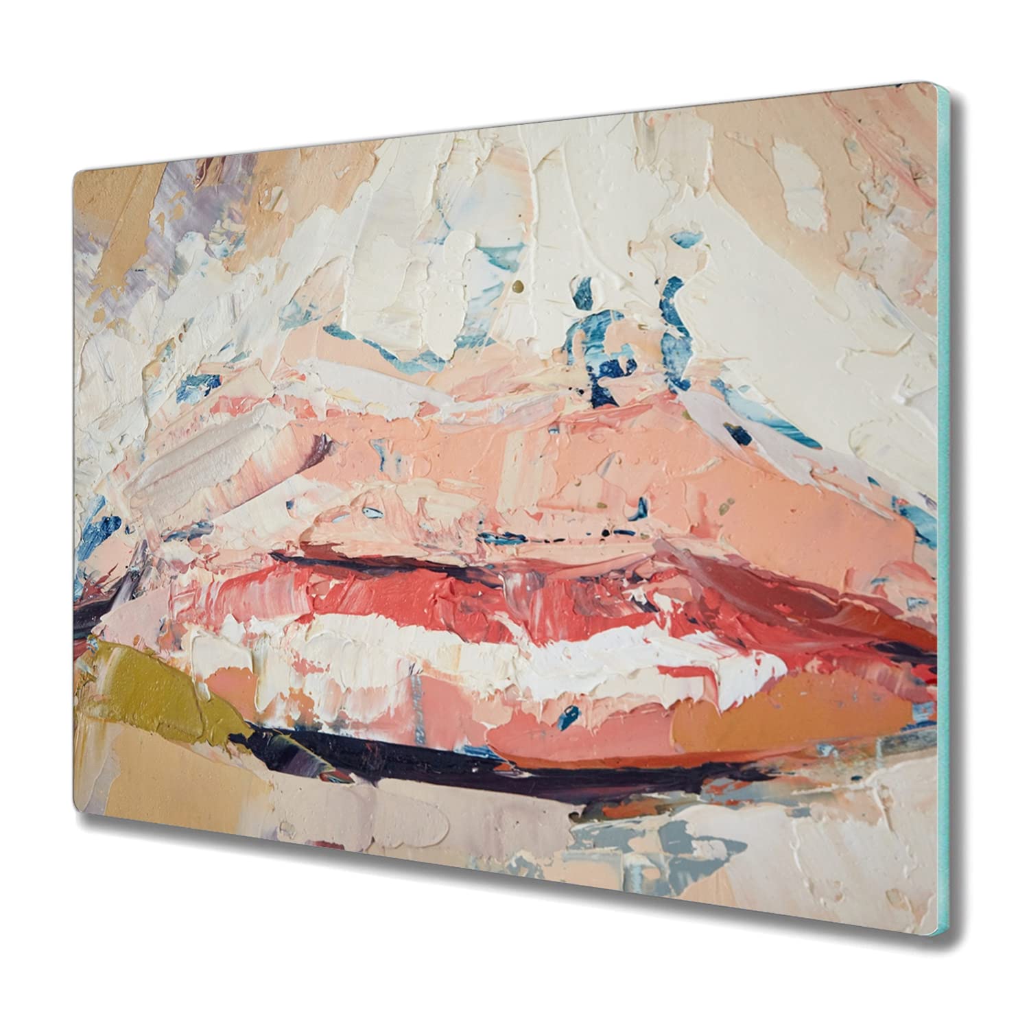 Plaque de cuisson induction protégée grâce au grand tapis de découpe verre 60x52cm