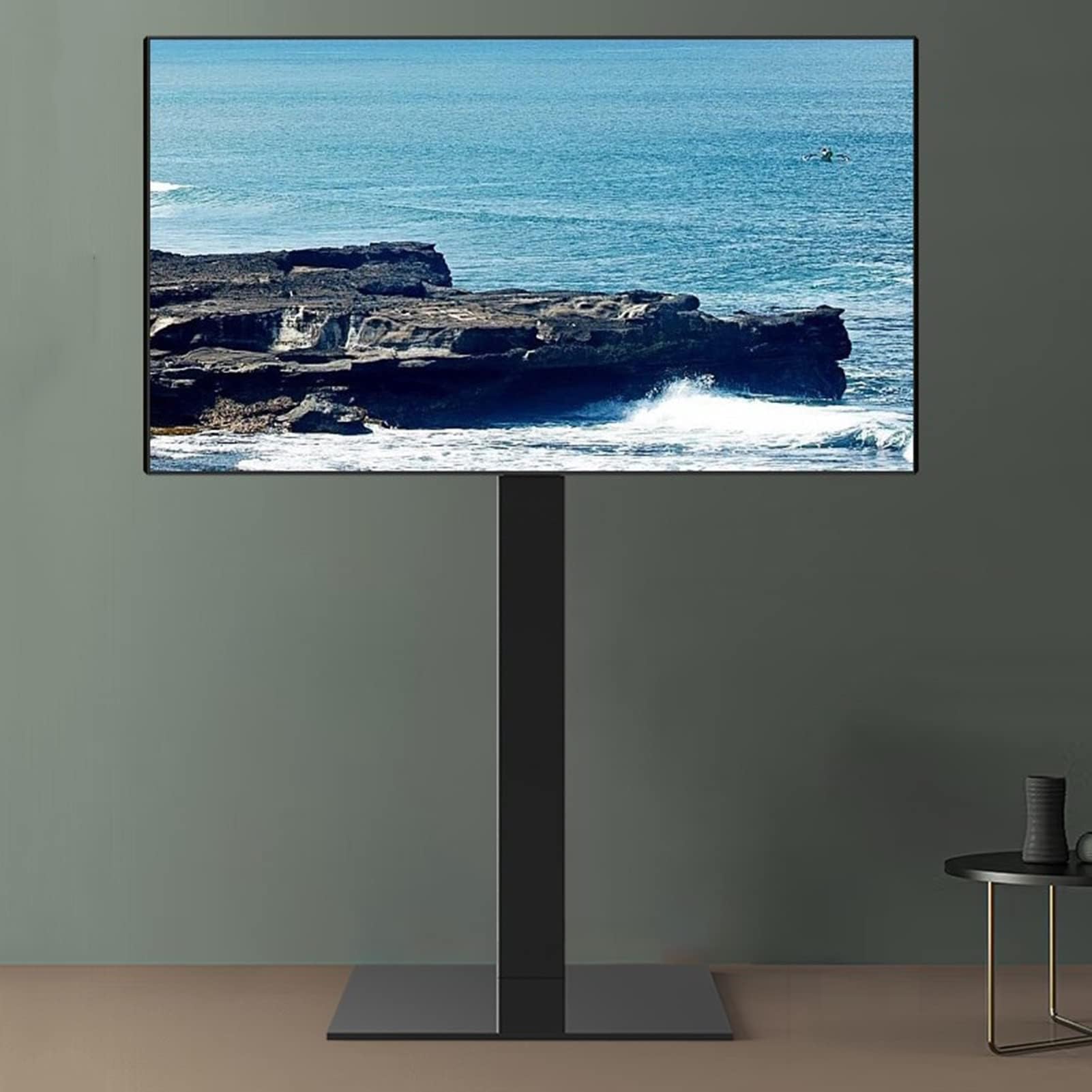 Support TV au sol gain de place pour salon sans percer les murs