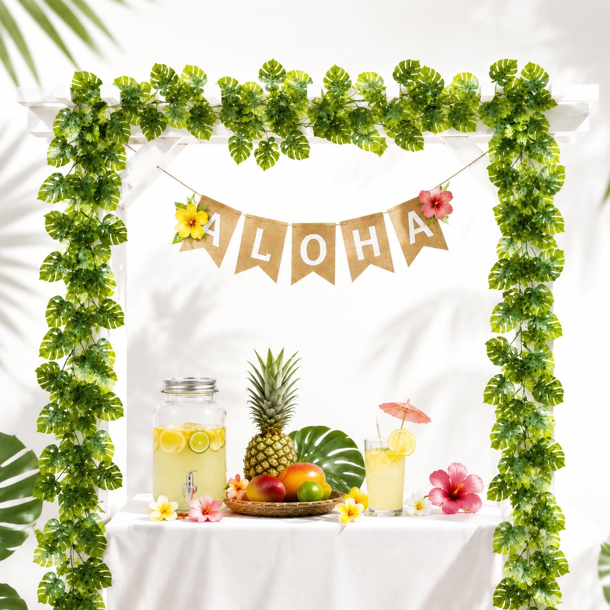 Photo 1 of HO2NLE 8Pcs Artificial Tropical Leaves Garland for Jungle Party, 5.9FT Fake Monstera Leaves Vines Hanging Plant Ivy Faux Palm Leaf Greenery Garland for Garden Porch Patio Beach Birthday Indoor Outdoor