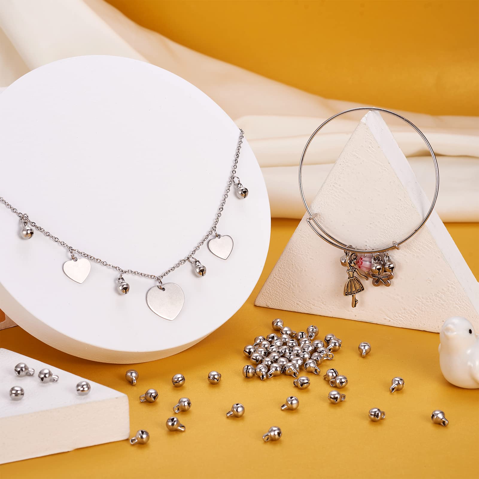 pandahall 100pcs Stainless Steel Jingle Bells 9x5.5x6mm Tiny Bell Dangle Charms Beads for Bracelet Necklace Jewelry Making, Hole: 1.8mm