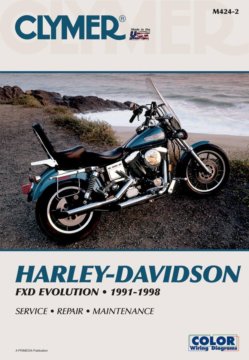 Clymer M4242 Repair Manual cover showing a Harley-Davidson FXD Evolution motorcycle on a beach.