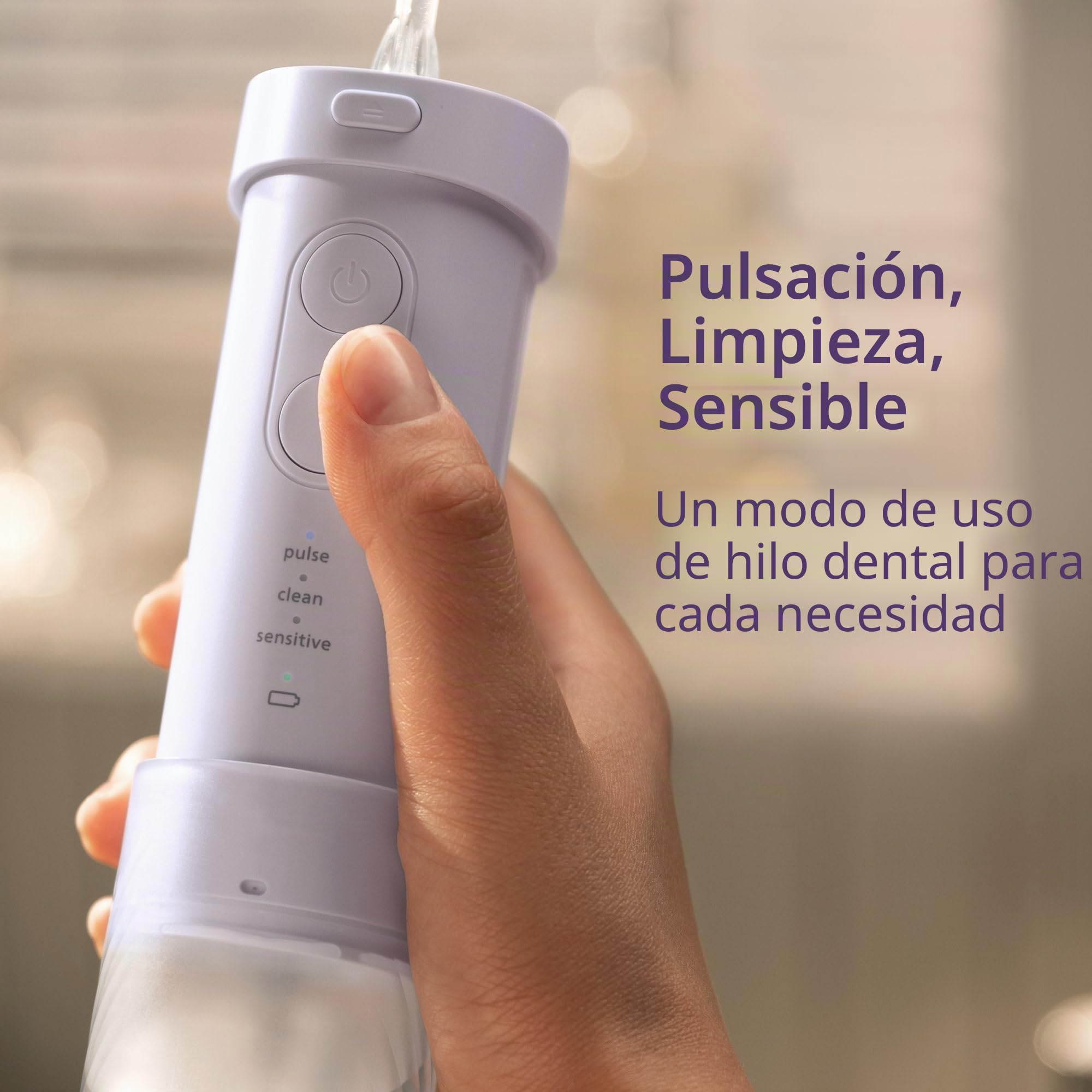 Philips Sonicare Compact Flosser 1000, irrigador dental portátil con 3 modos de hilo dental, irrigador bucal impermeable IPX7, apto para viajes, morado, modelo HX3333/23