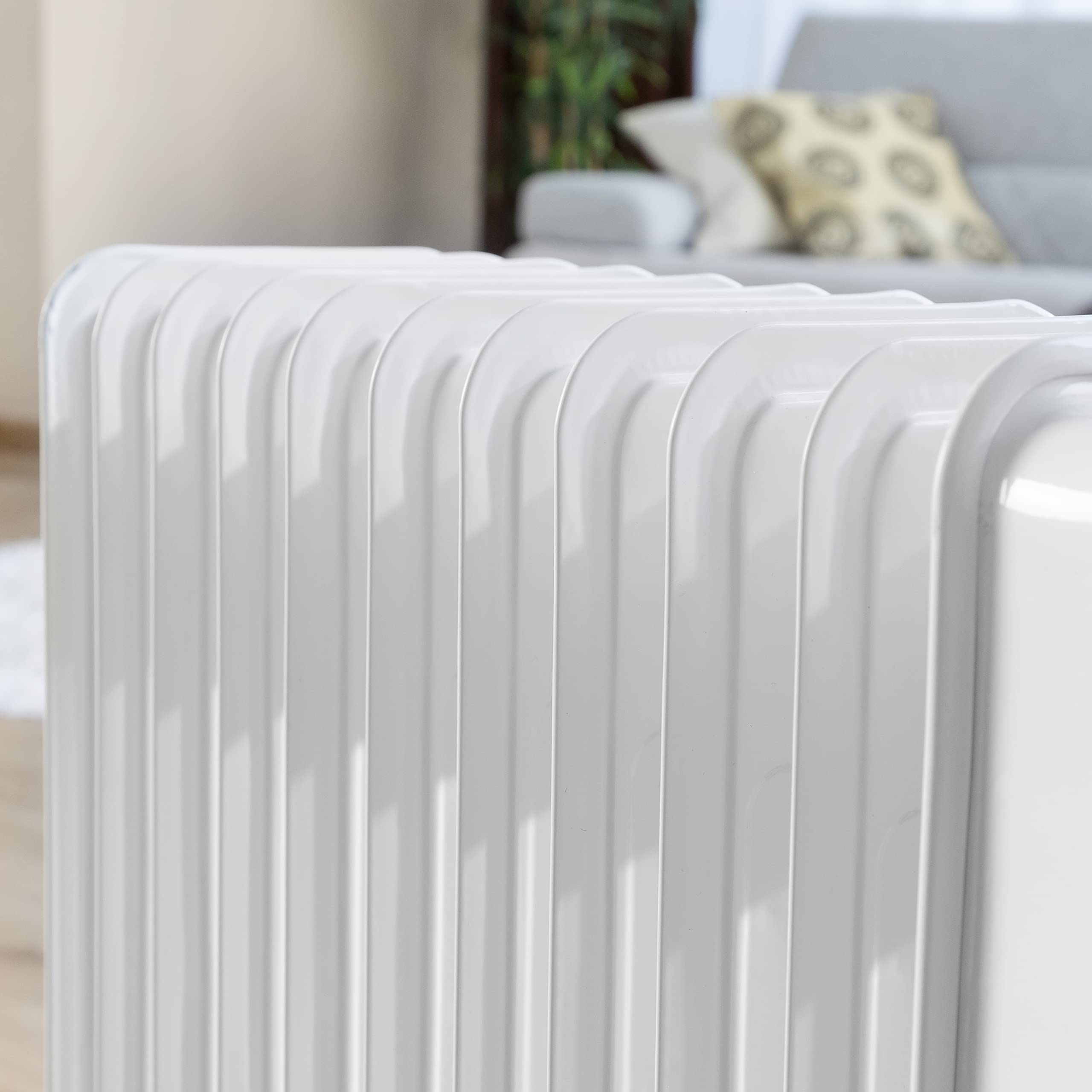 InnovaGoods® radiador electrico bajo consumo de aceite, termostato regulable, proteccion sobrecalentamiento, ruedas giratorias 360º, (blanco, 11 Módulos)