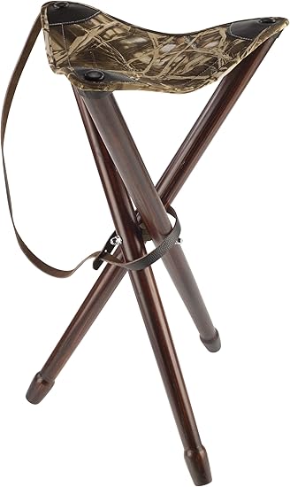 La Januel Ardenna Silla de trípode para Adulto en camuflaje rosela ofrece estabilidad y comodidad con un asiento a 65 cm de altura. Fabricada con materiales resistentes y duraderos, incluye una correa para facilitar su transporte.