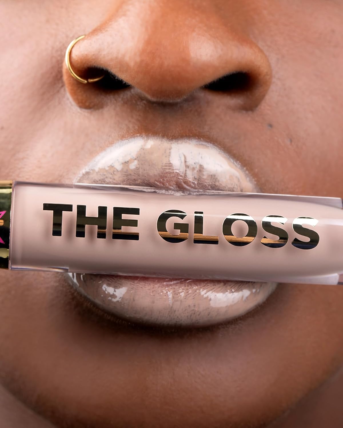 Jeffree Star Cosmetics The Gloss, Lip Gloss, 0.15 fl oz (Spank Me) / Amazon [en_US: The Gloss SPANK ME ~ Hot pink with platinum reflects and a metallic finish (I'm Shy)