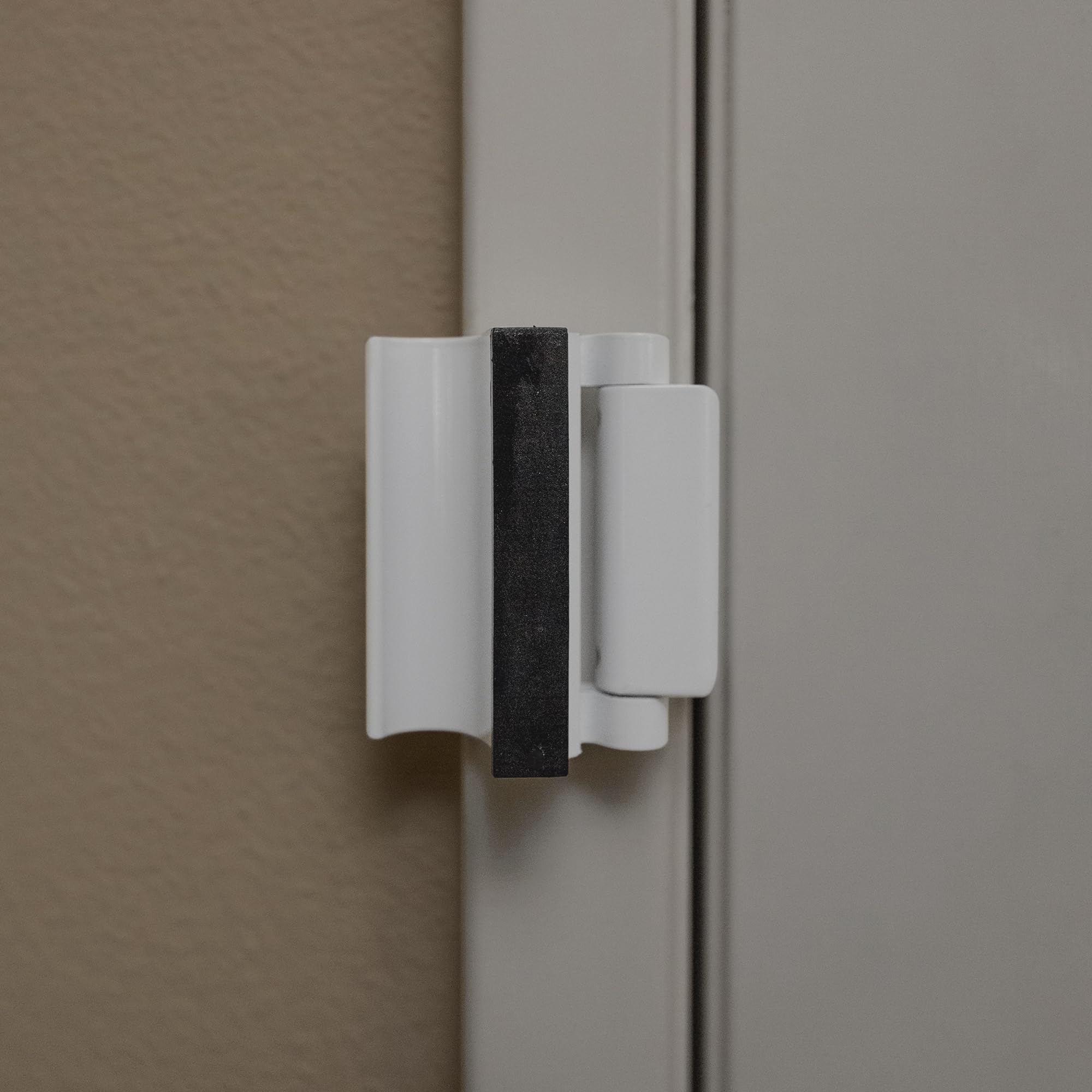 Prime-Line U 114707 Bloqueador de puertas, bronce