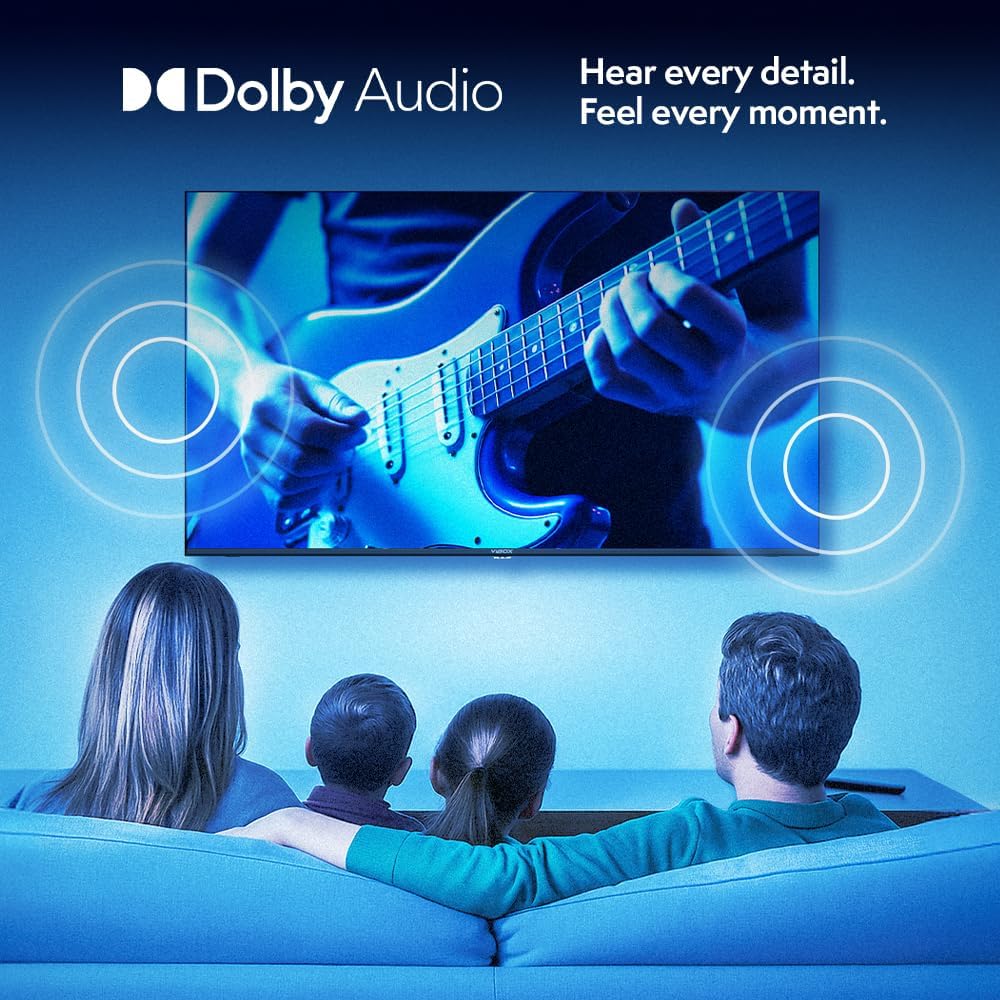 Family watching TV with Dolby Audio sound waves emanating from the screen