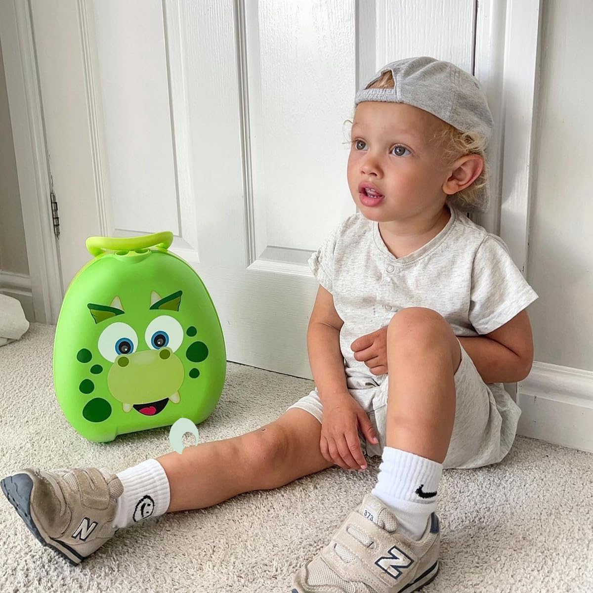 My Carry Potty - Dinosaur Travel Potty, Award-Winning Portable Toddler Toilet Seat for Kids to Take Everywhere