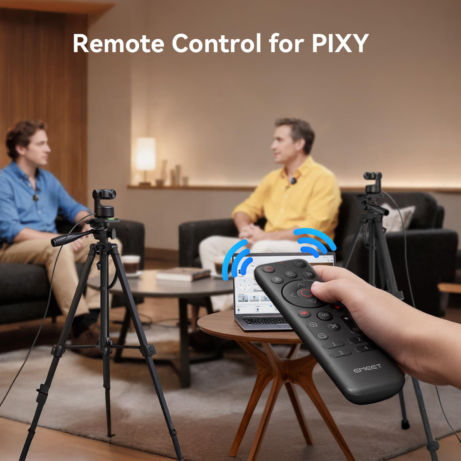 User operating EMEET Piko+ webcam with remote control during a streaming session.