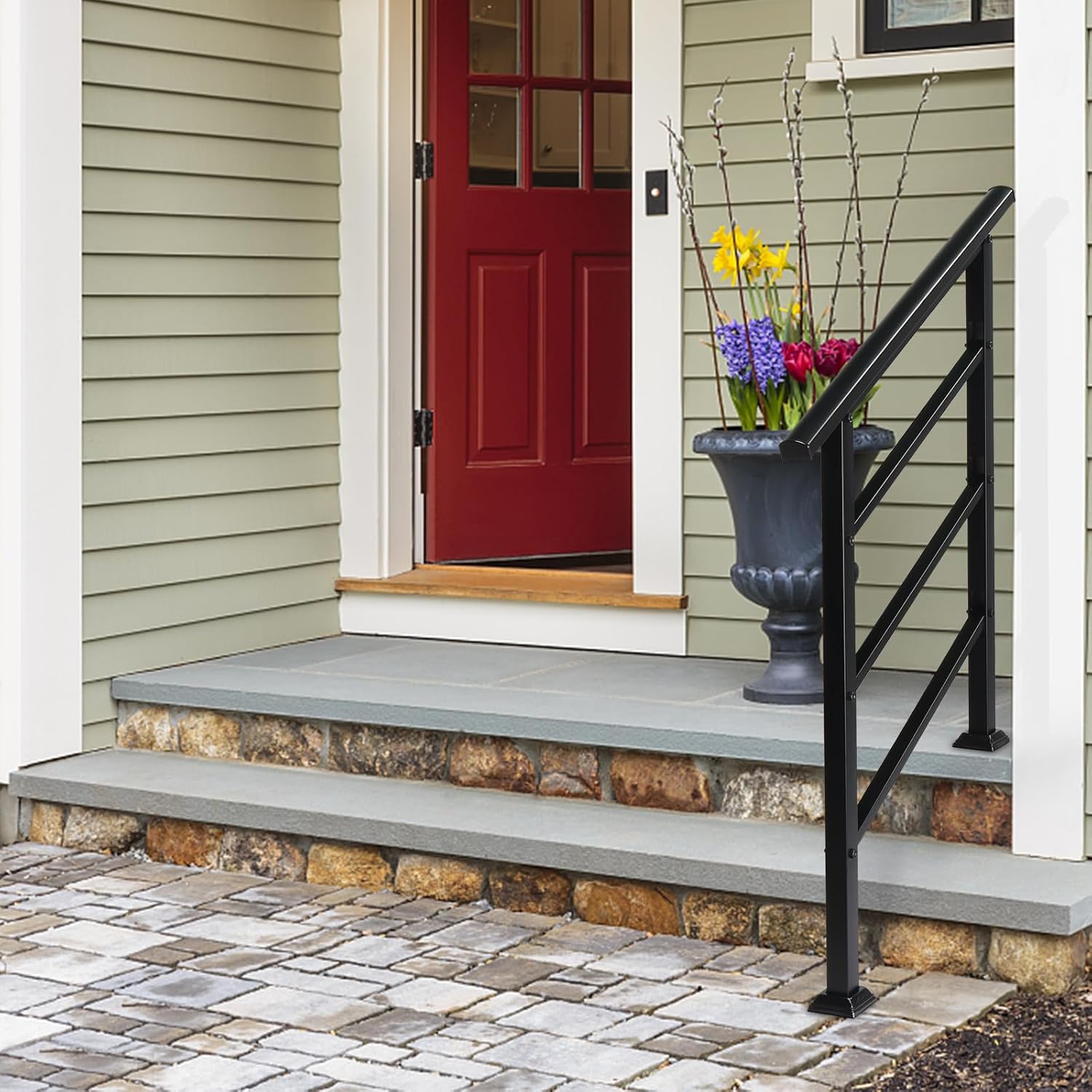 Karl home Handrail installed on a porch with brick and stone steps