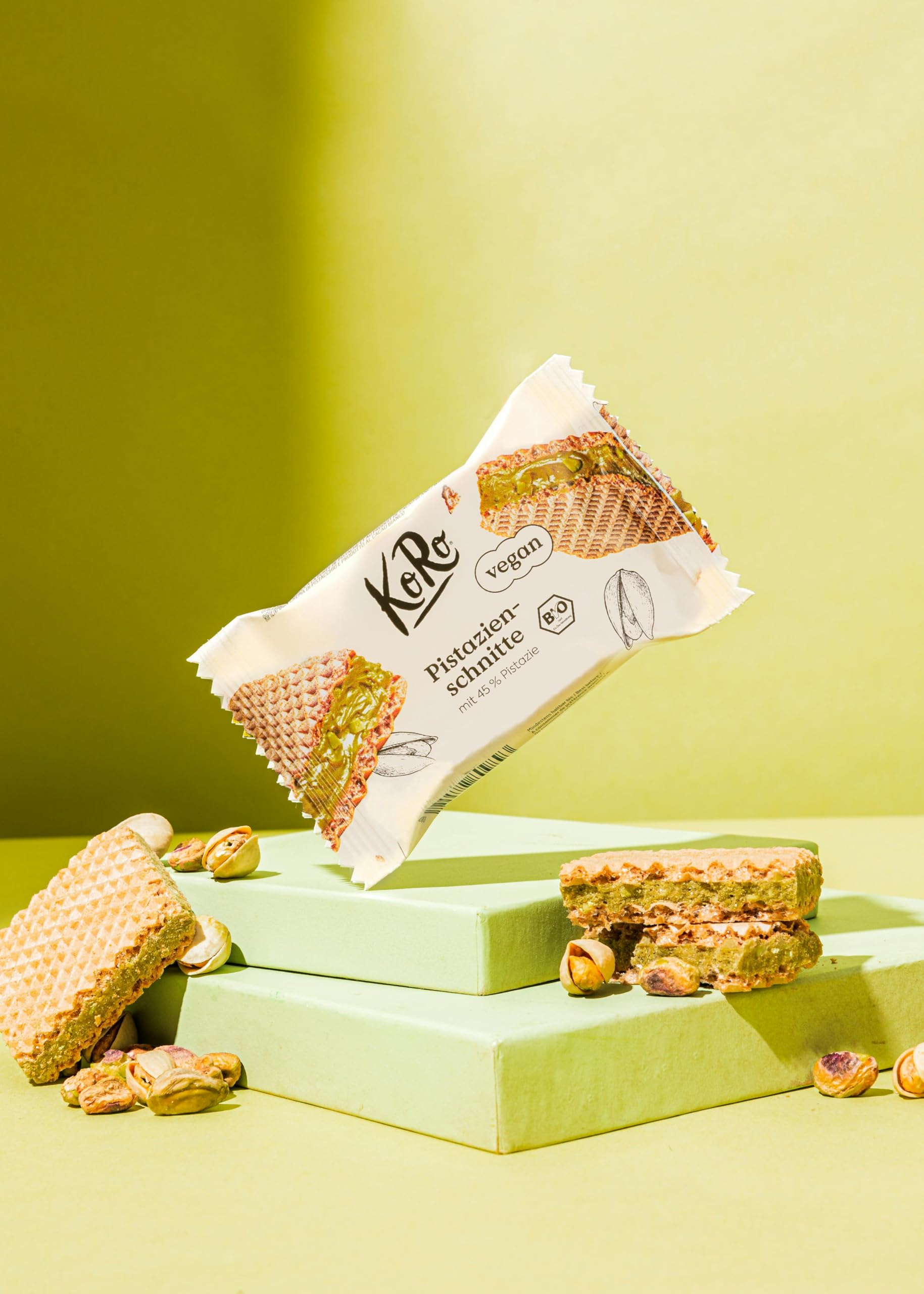 KoRo - Wafer ripieni con crema di pistacchi 22 g – 45% di ripieno ai pistacchi – Cioccolato bianco – Vegan