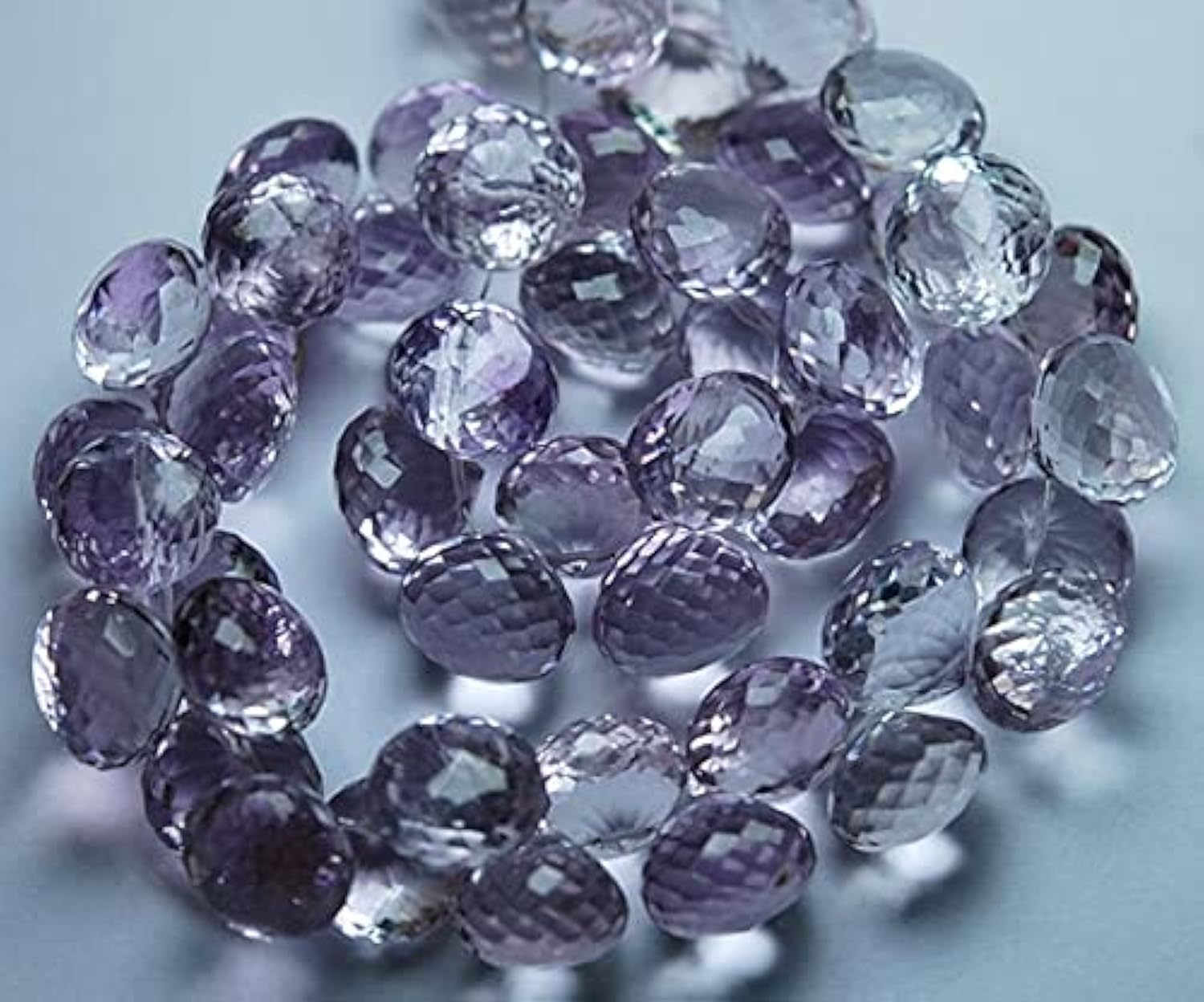Améthyste rose 10mm en briolette oignon pour réparer et assortir vos boucles