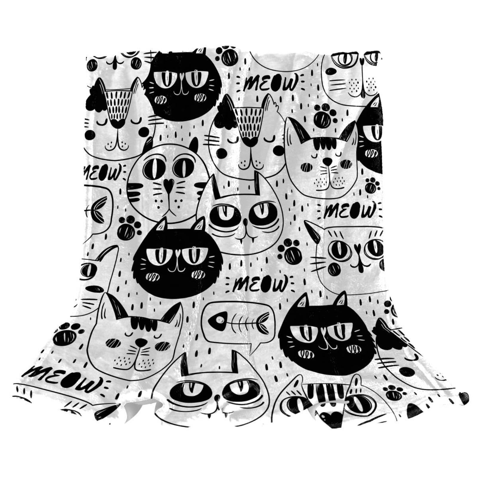 Couverture polaire chats noirs et blancs ideale pour cocooner chaleureusement sur le canape