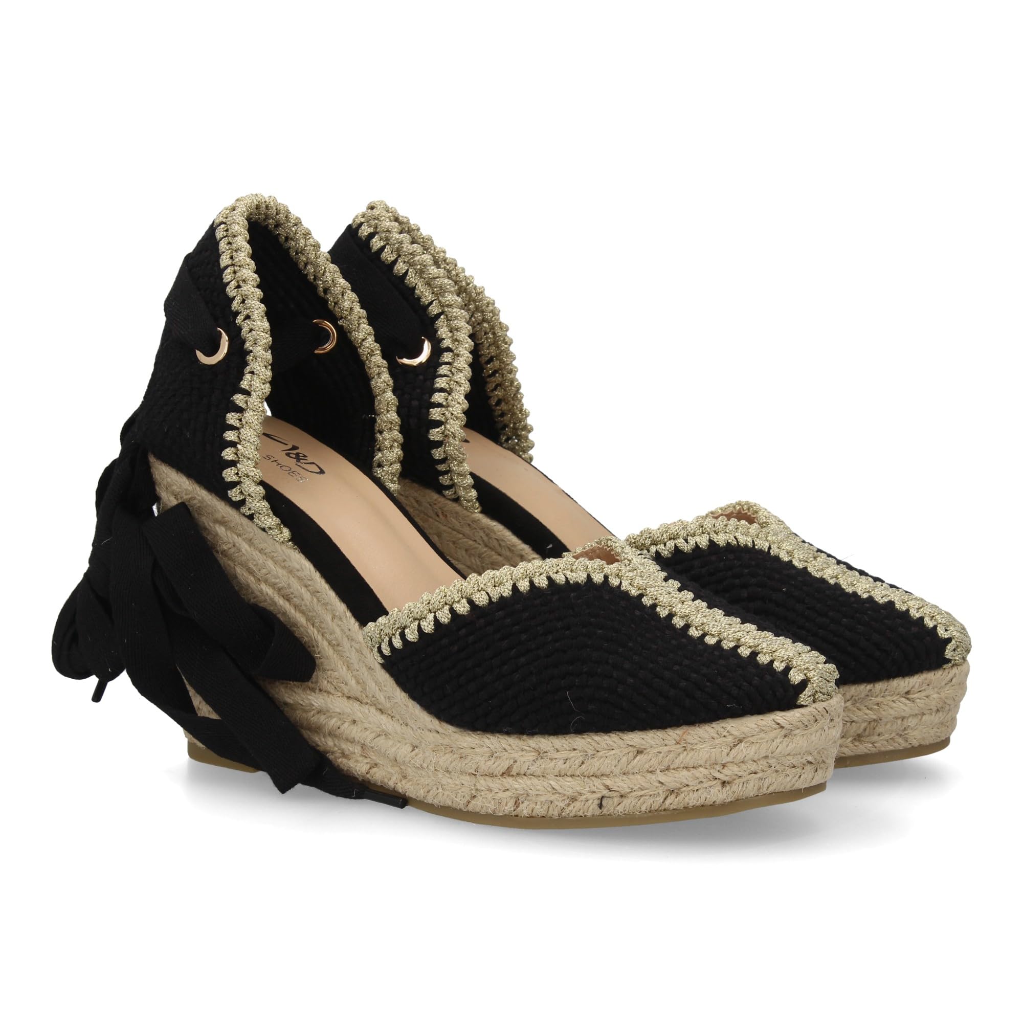 shoes&blues.es Alpargata de Mujer con Ribete Decorativo destaca por su Altura con Cuna Acolchada de Esparto. Cierre de Cintas. Un Modelo Comodo y Ligero para Verano.