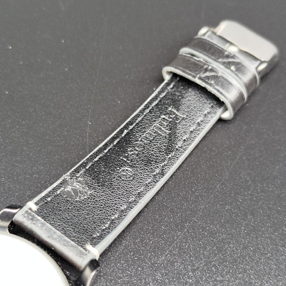 Close-up of the inside of the black leather strap of the Knot EH-38 Smartwatch.
