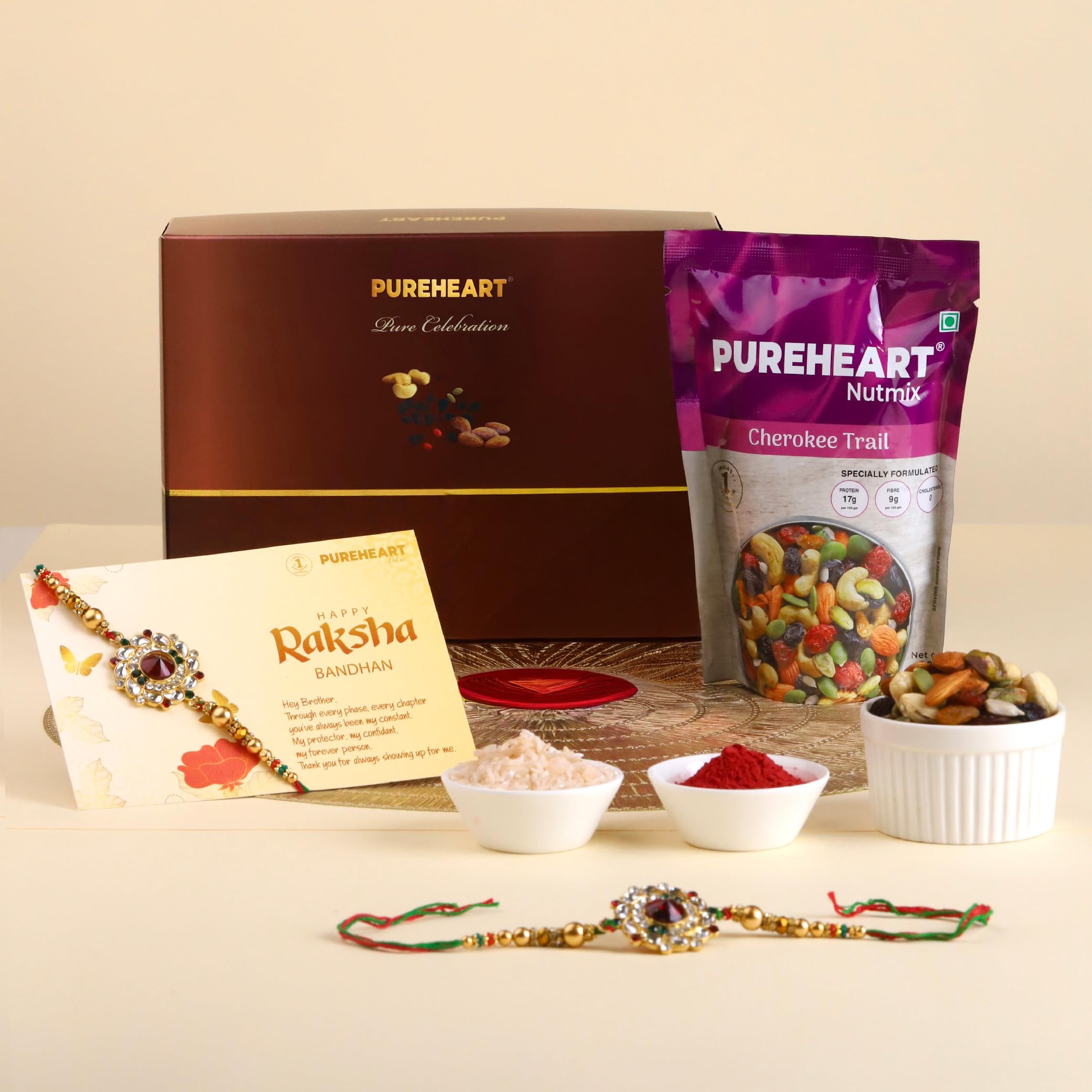 PUREHEART Rakhi Gift Hamper- Cherokee Trail Mix (80g) and Chocolates with Floral Rakhi for Brother, Gift Card, Pooja Rice, Kumkum - Dry Fruits and Nuts Gift-image-13