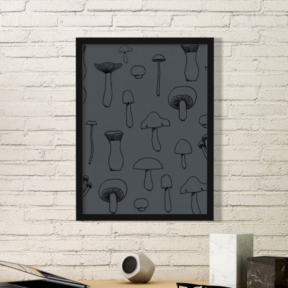 Cadre photo champignon mignon pour embellir un espace de travail sombre avec une touche de nature