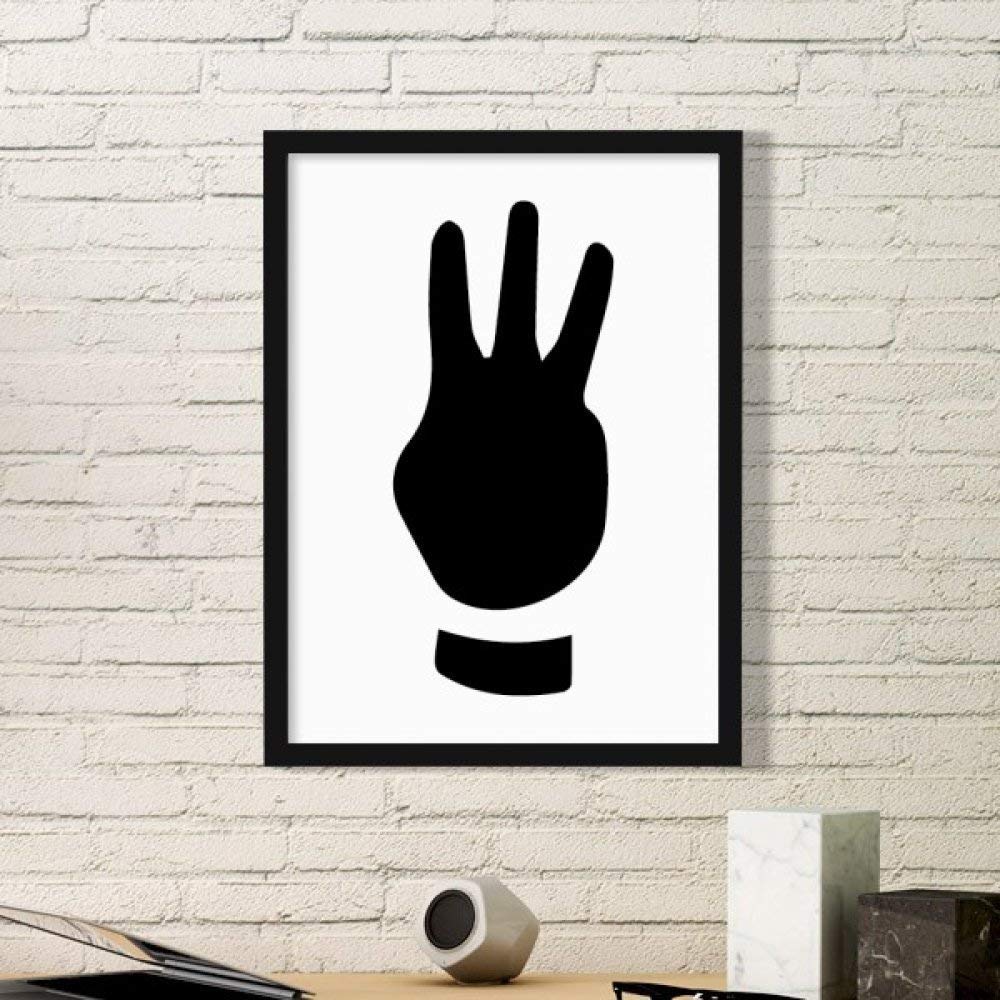 Peinture silhouette de trois gestes dans son cadre en bois noir DIYthinker pour table de chevet
