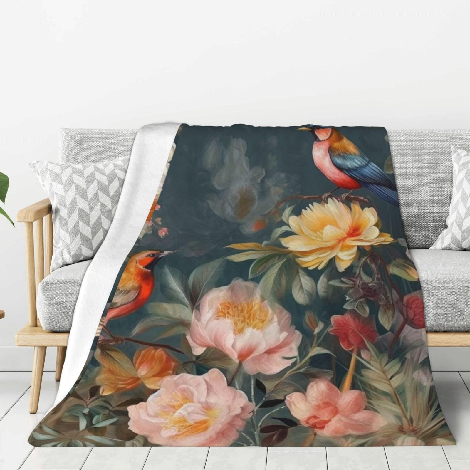 Couverture polaire flanelle légère pour des soirées cocooning confortables sur le canapé