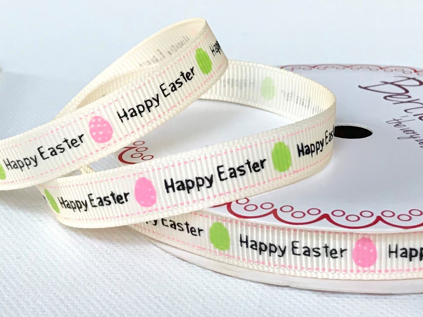 Bertie's Bows Ivory Happy Easter 9Mm Grosgrain Ribbon On A 3M Lenght (N.b. This Is A Cut From A Roll, Presented On A Ribbon Card)