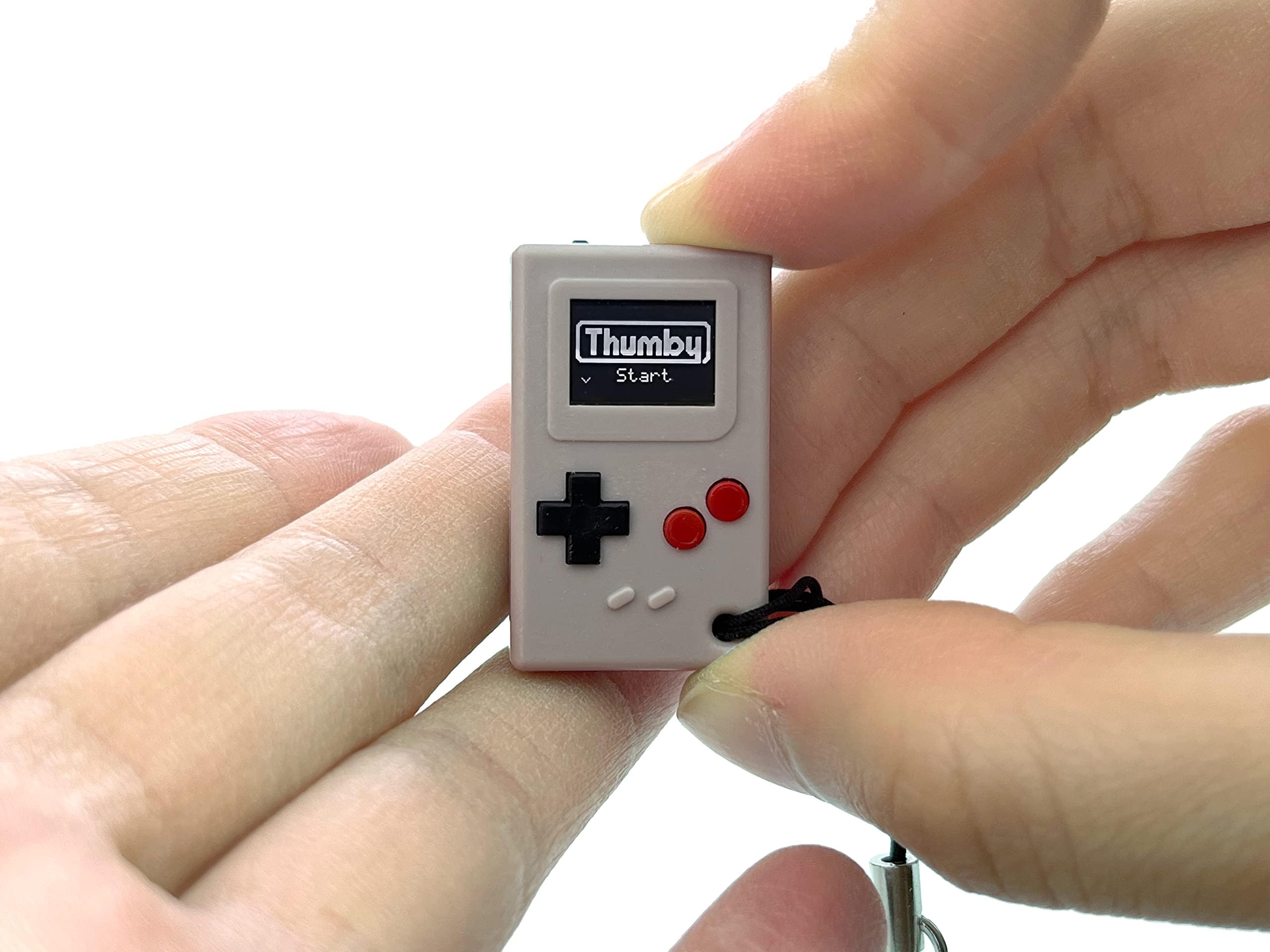 TinyCircuits Thumby Programmable Game Console Keychain – Retro Gaming Fun Mini-Console, STEM Learning, USB Rechargeable, 5 Preloaded Games (Gray)
